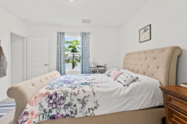 bedroom with visible vents