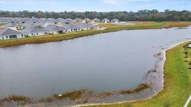 aerial view with a residential view and a water view