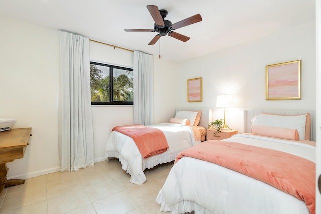 bedroom featuring light tile patterned floors and ceiling fan