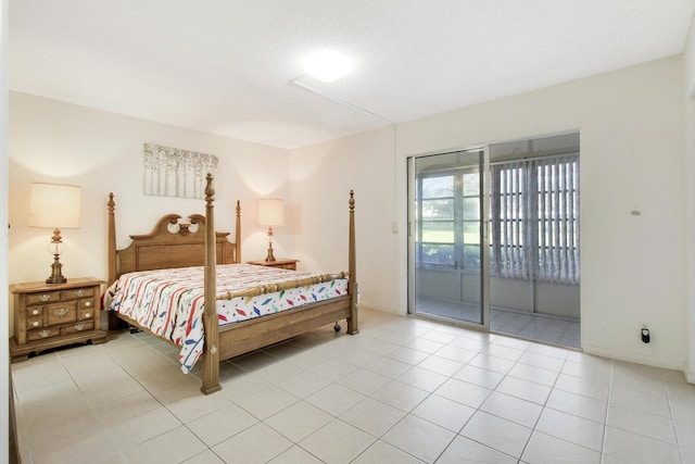 bedroom with light tile patterned flooring and access to outside