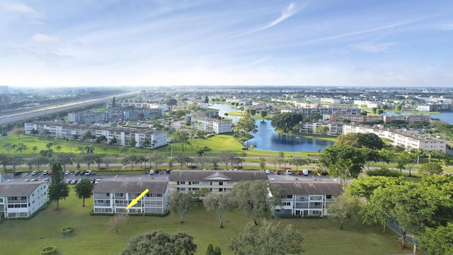 drone / aerial view featuring a water view