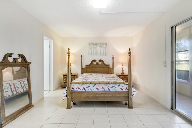 tiled bedroom with access to outside