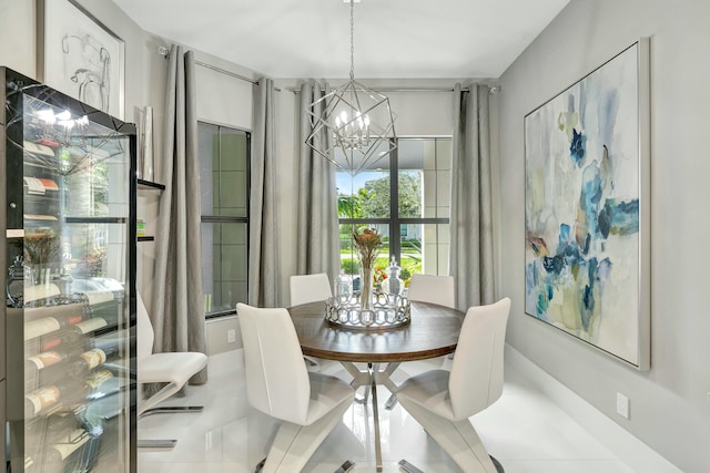 5525 Renoir Pl, Palm Beach Gardens, FL 33418 - dining room with tile patterned floors and a notable chandelier