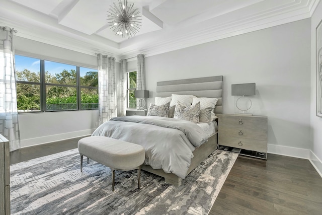 bedroom featuring dark hardwood / wood-style flooring, a notable chandelier, and ornamental molding