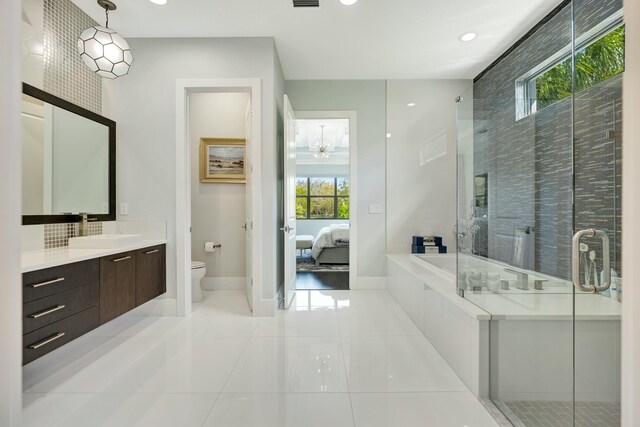 full bathroom featuring plus walk in shower, tasteful backsplash, vanity, toilet, and tile patterned floors