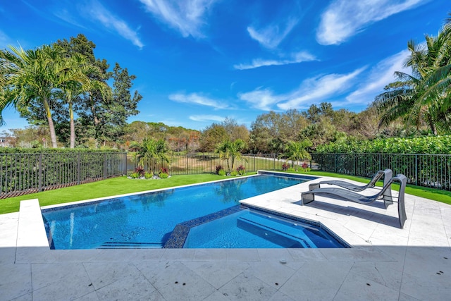 view of pool featuring an in ground hot tub, a yard, and a patio area