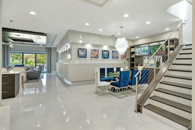 5525 Renoir Pl, Palm Beach Gardens, FL 33418 - interior space featuring a notable chandelier and stairway