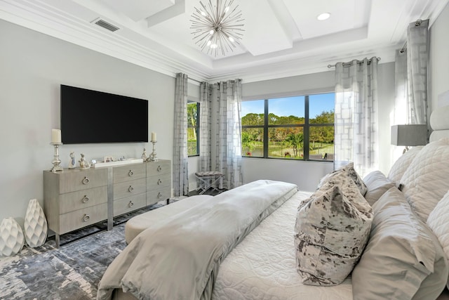 bedroom with ornamental molding, a raised ceiling, and a notable chandelier