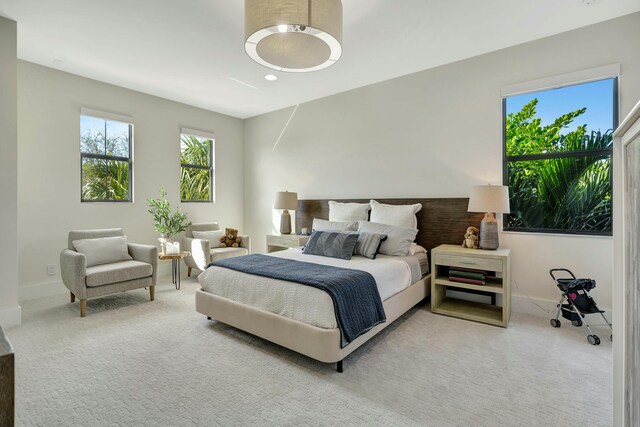 5525 Renoir Pl, Palm Beach Gardens, FL 33418 - bedroom with light carpet and baseboards