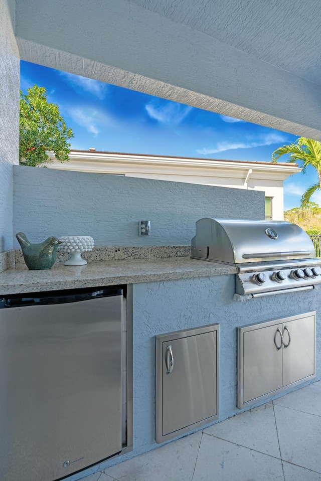 view of patio featuring area for grilling and grilling area