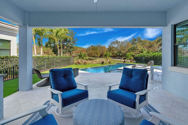 view of swimming pool featuring a patio area