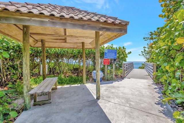 view of patio featuring a water view