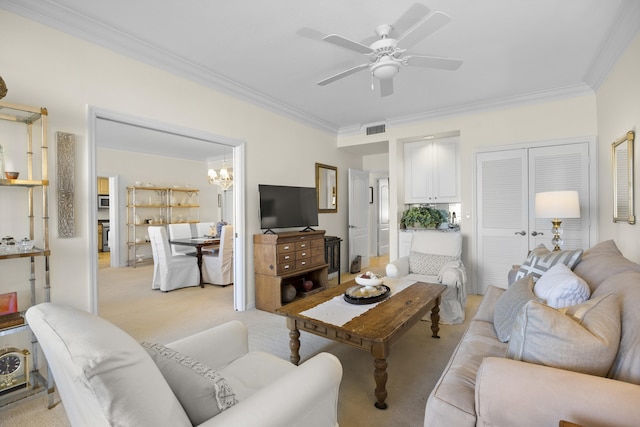 living room with light carpet, crown molding, and ceiling fan with notable chandelier