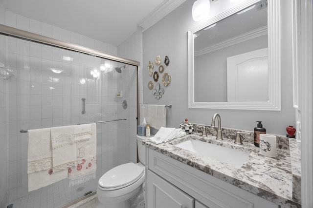 bathroom with walk in shower, ornamental molding, toilet, and vanity