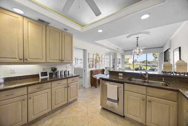 kitchen featuring sink, crown molding, hanging light fixtures, stainless steel dishwasher, and a raised ceiling