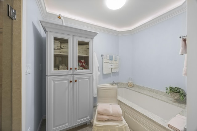 bathroom with ornamental molding