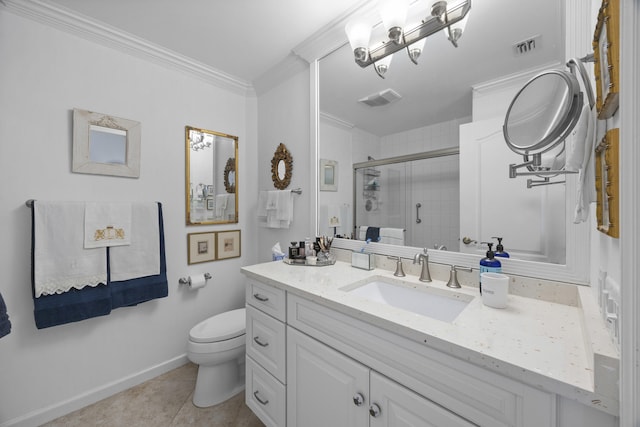 bathroom with tile patterned floors, toilet, a shower with shower door, crown molding, and vanity