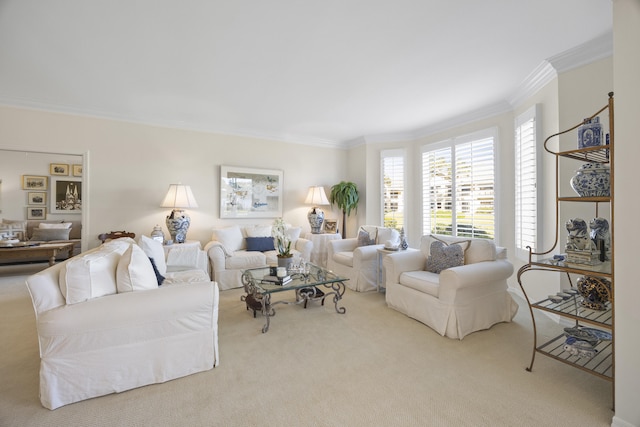 living room featuring crown molding and light carpet