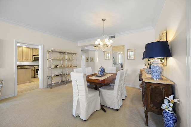 dining area featuring light carpet, a notable chandelier, and crown molding