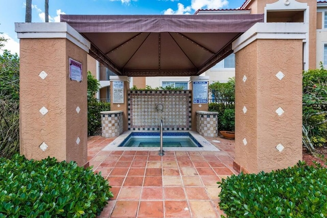 view of pool featuring a community hot tub