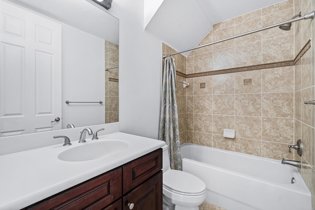 full bathroom featuring vanity, shower / tub combo, and toilet