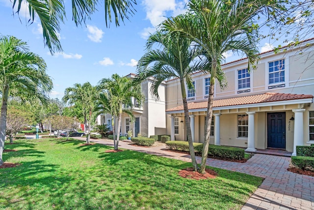 exterior space with a front yard