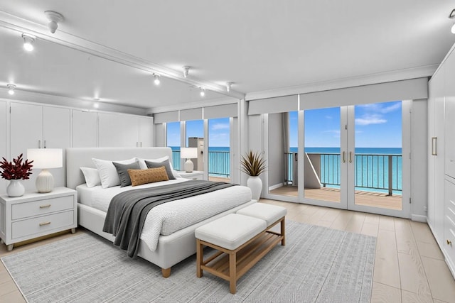 3000 S Ocean Blvd Unit 1504, Boca Raton, FL 33432 - bedroom with access to exterior, light wood-style flooring, and a water view
