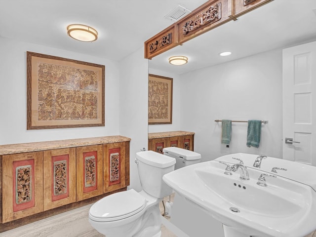 3000 S Ocean Blvd Unit 1504, Boca Raton, FL 33432 - bathroom featuring toilet and a sink