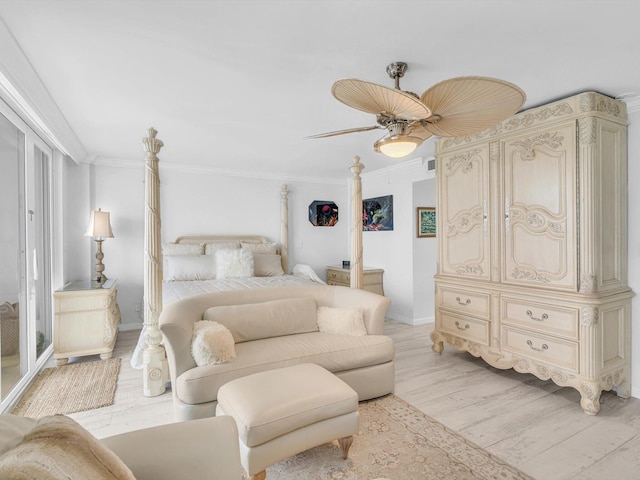 bedroom featuring ceiling fan, ornamental molding, and light wood-type flooring