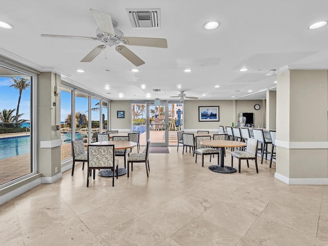3000 S Ocean Blvd Unit 1504, Boca Raton, FL 33432 - dining room featuring a ceiling fan, baseboards, recessed lighting, healthy amount of natural light, and crown molding