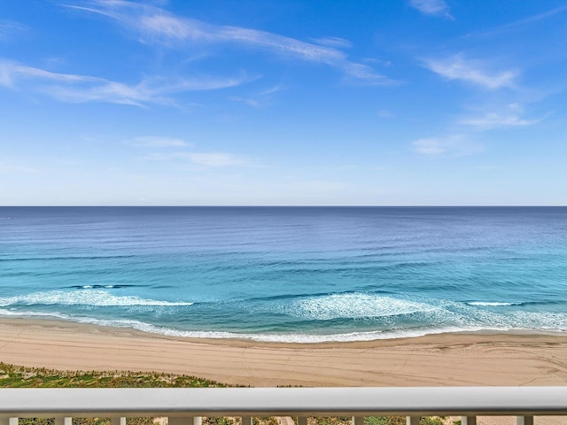 property view of water featuring a beach view