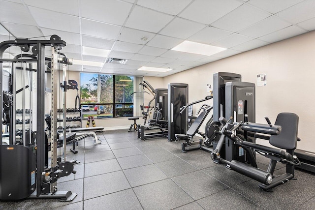5121 Oak Hill Ln Unit 416, Delray Beach, FL 33484 - exercise room with baseboards and a paneled ceiling
