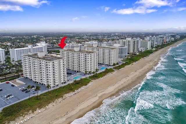 aerial view with a view of the beach and a water view