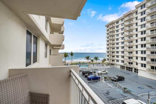 balcony featuring a water view