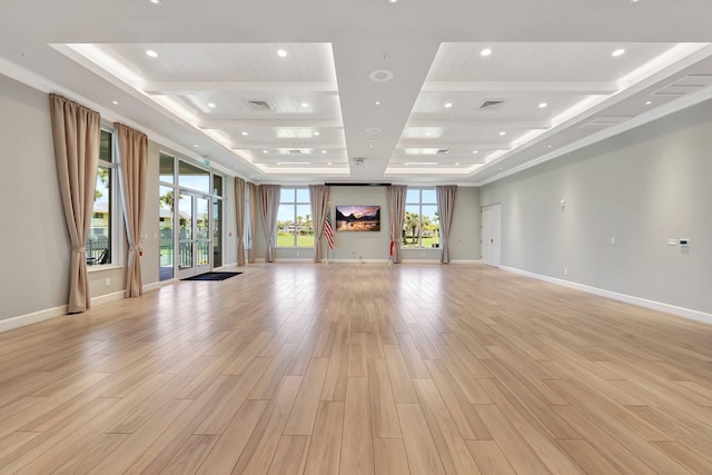 unfurnished living room featuring recessed lighting, visible vents, light wood-style flooring, and baseboards