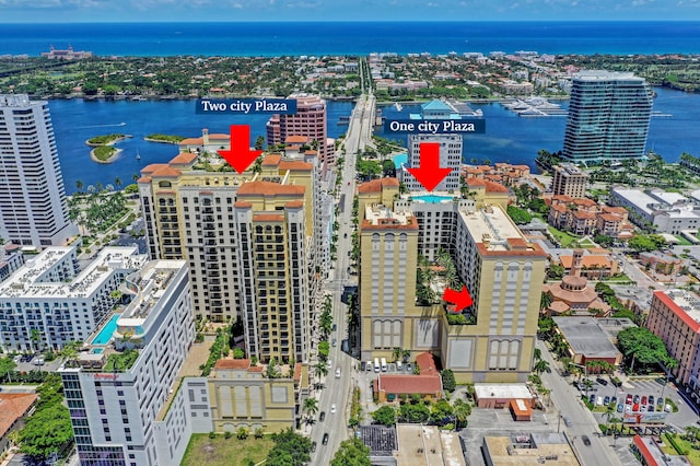 birds eye view of property featuring a water view