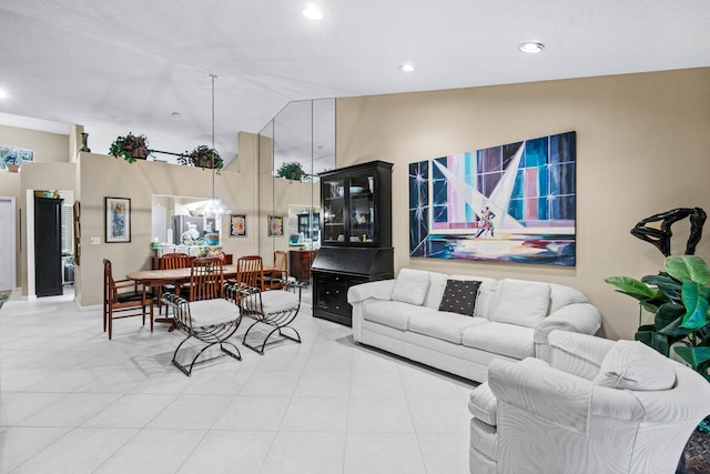 living room featuring lofted ceiling