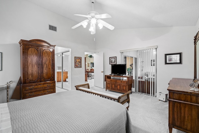 carpeted bedroom featuring high vaulted ceiling and ceiling fan