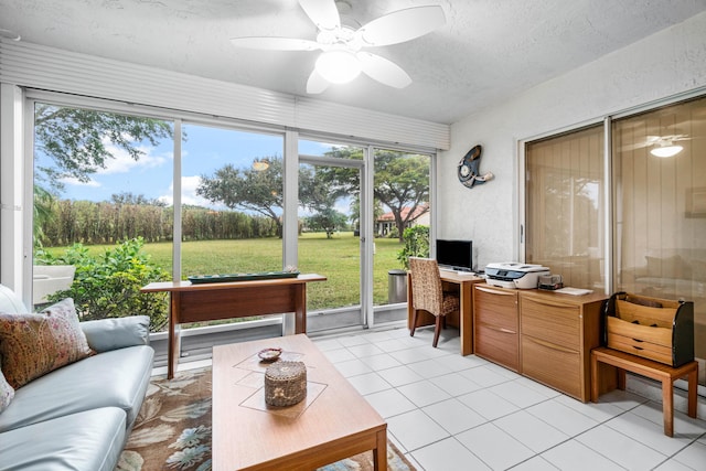 sunroom / solarium with ceiling fan