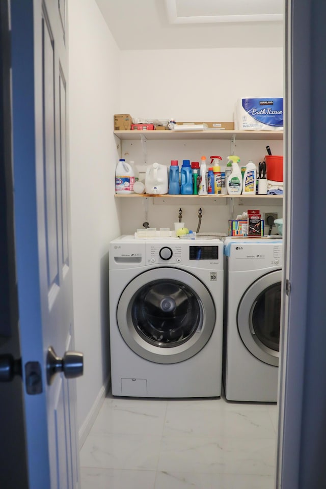 laundry room featuring independent washer and dryer