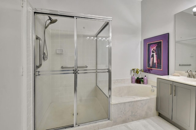 bathroom featuring tile patterned floors, vanity, and plus walk in shower