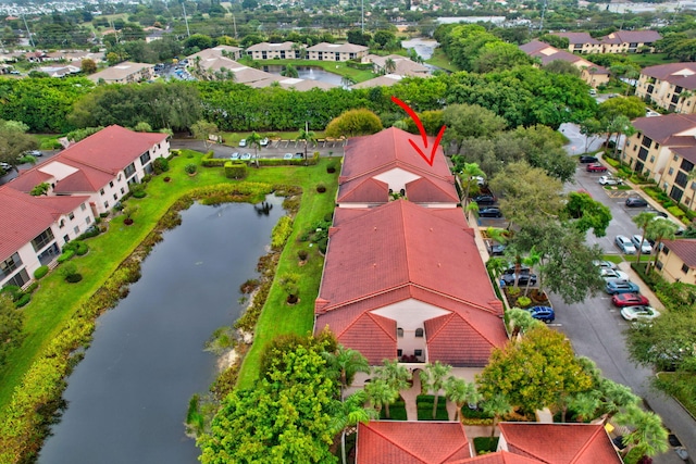 drone / aerial view featuring a water view