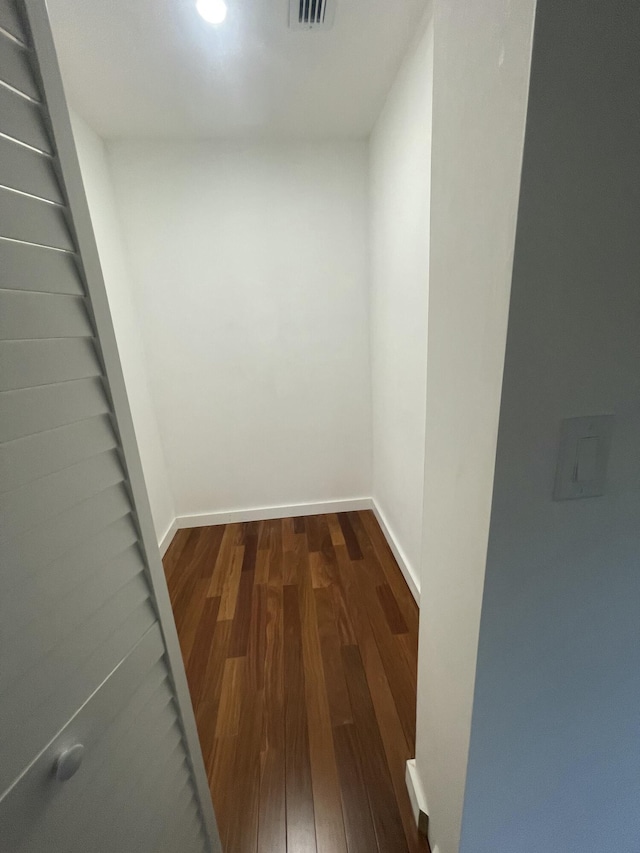 hall featuring dark hardwood / wood-style floors