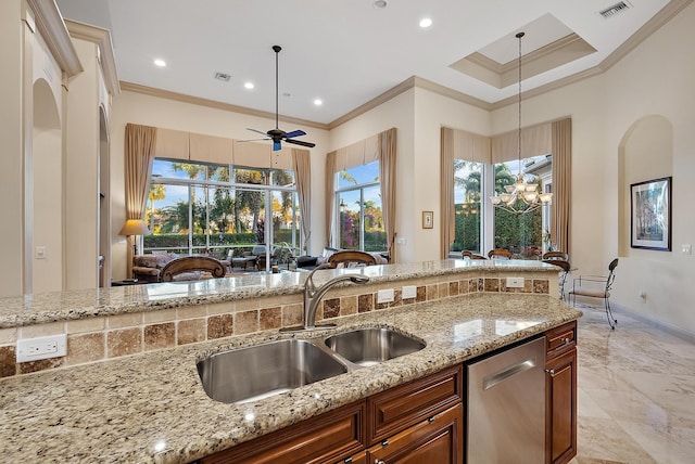 kitchen featuring light stone counters, sink, ornamental molding, and dishwasher