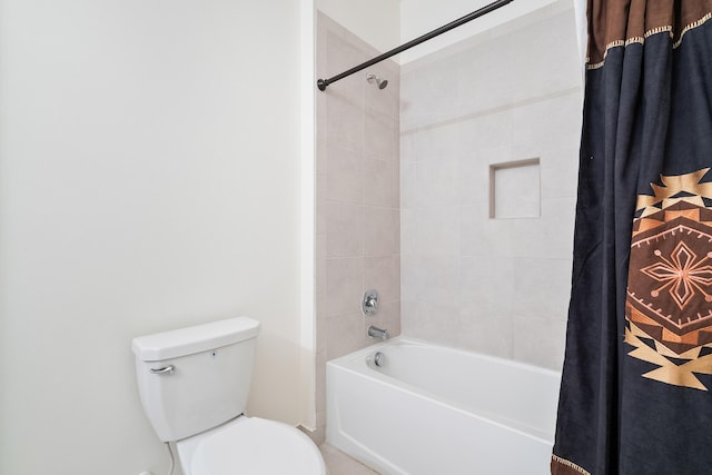 bathroom with toilet and shower / tub combo