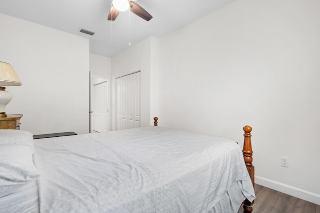 bedroom featuring hardwood / wood-style floors and ceiling fan