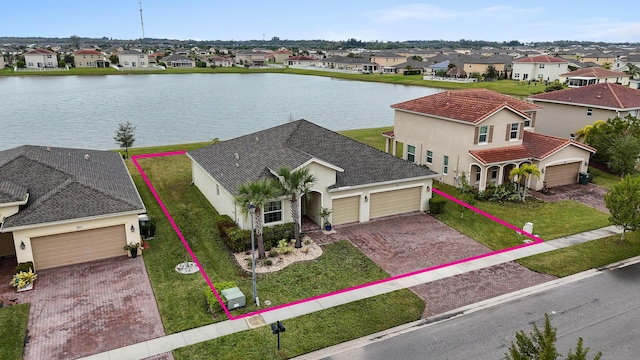 bird's eye view with a water view