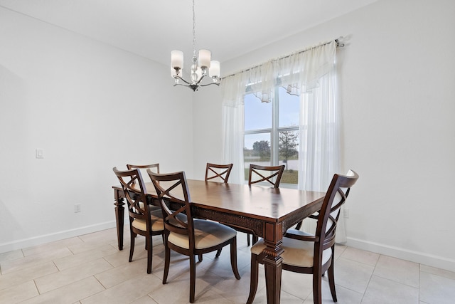 dining room featuring a notable chandelier