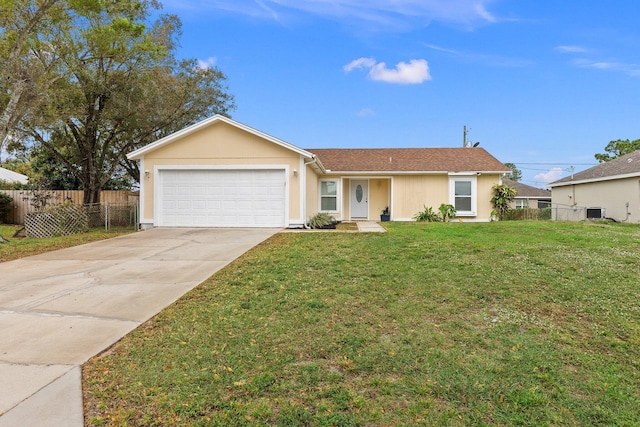 single story home with a garage, central air condition unit, and a front lawn