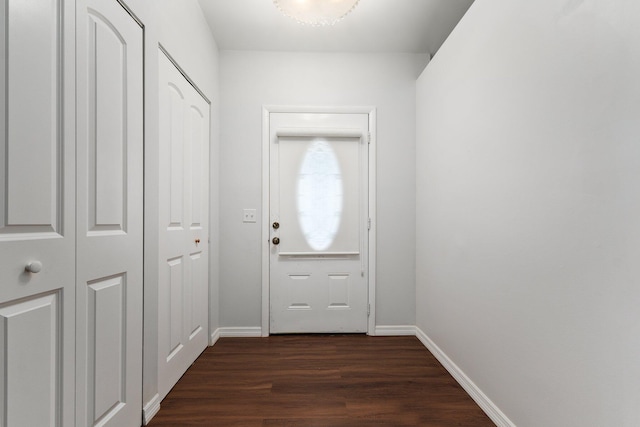 doorway to outside with dark hardwood / wood-style floors